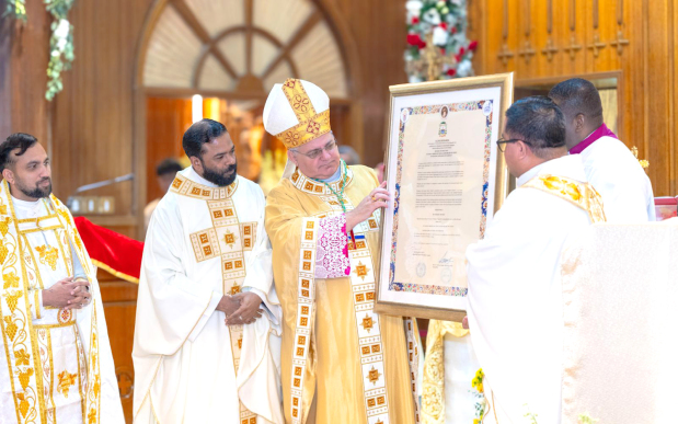 <p><em><strong>Bishop Berardi, third from left, with Father Francis, second from left, and other clergy members with a plaque reflecting the official designation of the church as a shrine</strong></em></p><p>Scores of parishioners attended a mass commemorating the official designation of the Sacred Heart Catholic Church as a shrine. The event coincided with the church’s sapphire jubilee celebration. The service in the ‘Mother Church’ in Manama was presided over by the Apostolic Vicar of Northern Arabia Bishop Aldo Berardi. Parish priest Father Francis Joseph was appointed as the first rector of the shrine – the Vicariate of the Sacred Heart of Jesus. A cultural programme will be held on November 27.&nbsp;</p><div class="explain-selected-button explain-selected-circle"></div><style>
.explain-selected-button.explain-selected-text-selected-show-button {
  display: block !important;
}

.explain-selected-button.explain-selected-expanded {
  width: 400px;
  border: 0px;
  cursor: default; 
  height: 350px; 
  overflow: auto;
  box-shadow: rgba(15, 15, 15, 0.05) 0px 0px 0px 1px, rgba(15, 15, 15, 0.1) 0px 3px 6px, rgba(15, 15, 15, 0.2) 0px 9px 24px;
}

.explain-selected-button.explain-selected-circle:not(.explain-selected-expanded) {
  width: 35px;
  height: 35px;
  background: transparent;
  border-radius: 50%;
  opacity: 0.5;
}
.explain-selected-button.explain-selected-circle:not(.explain-selected-expanded):hover::before {
  content: "";
  position: absolute;
  width: 35px;
  height: 35px;
  background-color: rgba(128, 0, 128, 0.5);
  border-radius: 50%;
  top: 50%;
  left: 50%;
  transform: translate(-50%, -50%);
  animation: explain-selected-growAndFade 2.0s ease-in-out;
  animation-iteration-count: infinite;
}

.explain-selected-button.explain-selected-circle:not(.explain-selected-expanded)::after {
  content: "";
  position: absolute;
  width: 10px;
  height: 10px;
  background-color: rgb(128, 0, 128);
  top: 50%;
  left: 50%;
  transform: translate(-50%, -50%);
  border-radius: 50%;
}
.explain-selected-button.explain-selected-circle:not(.explain-selected-expanded):hover::after {
  width: 14px;
  height: 14px;
}

@keyframes explain-selected-growAndFade {
  0% {
    width: 10px;
    height: 10px;
    opacity: 1;
  }
  100% {
    width: 30px;
    height: 30px;
    opacity: 0;
  }
}

.explain-selected-button {
  display: none !important;
  width: 120px;
  height: 28px;
  border-radius: 4px;
  border: 0px;
  position: absolute;
  z-index: 9999;
  opacity: 1;
  cursor: pointer;
  background: white;
  text-align:left;
  font-family: Tahoma,Arial,Helvetica Neue,Helvetica,sans-serif; 
  background-color: #fff;
  color: #333;
}

.swal2-icon-show-explainselected {
  border: none;
}

.swal2-container p {
  margin: 0 !important;
}

</style>
